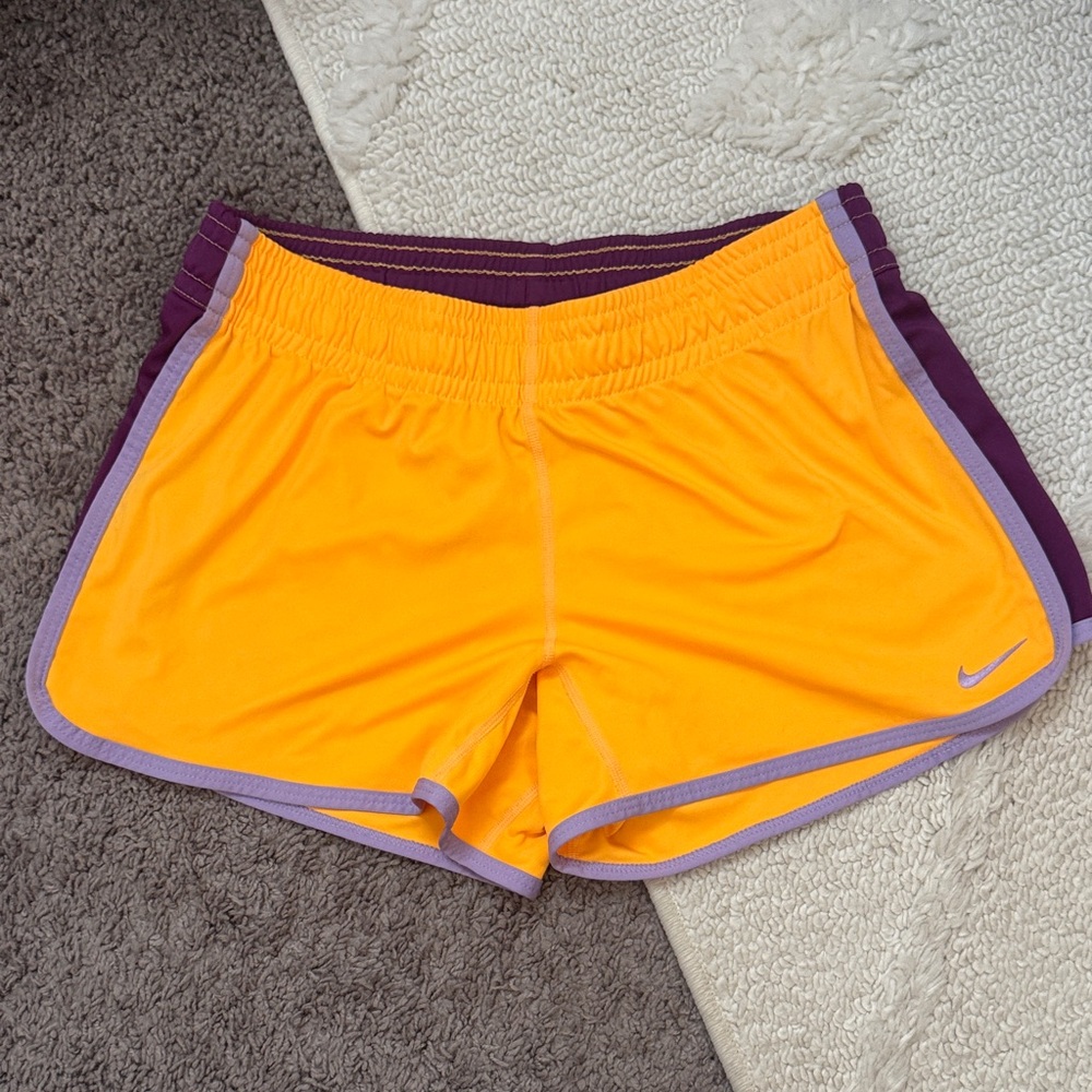 Nike Women’s Orange Athletic Shorts with Purple Trim